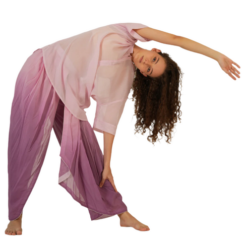 Woman wearing lavender ombre YogaFlow set in 100% cotton — breathable yoga wear for mindful movement and sunlit, slow living.