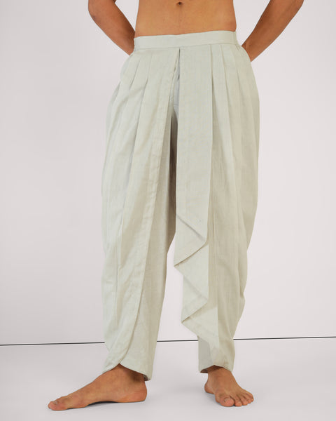 Front close-up of male standing relaxed in Vibhuti Grey linen cotton yoga pants, breathable natural fabric, studio white background.