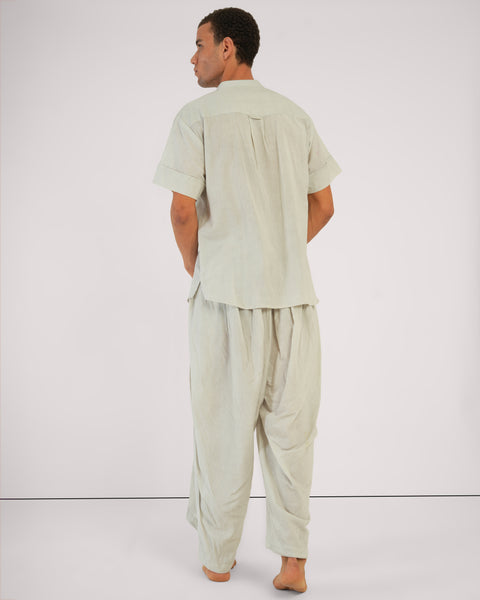 Back view of model wearing Shanti Chola Vibhuti Grey YogaWear Set, crafted from breathable Linen Cotton Blend, ideal for meditation and mindful living.
