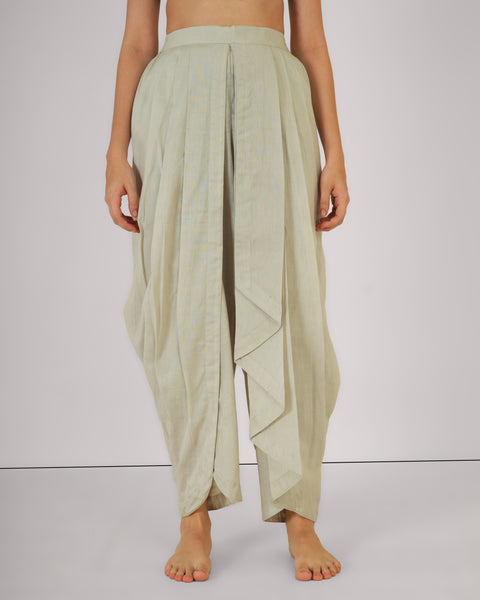 Front view of female standing straight wearing Vibhuti Grey linen cotton yoga pants, breathable natural fabric, white studio background.