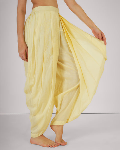 Close-up of Chaand YogaFlow dhoti in 100% cotton — breathable yoga wear with fluid drape, soft texture, and natural Indian elegance.